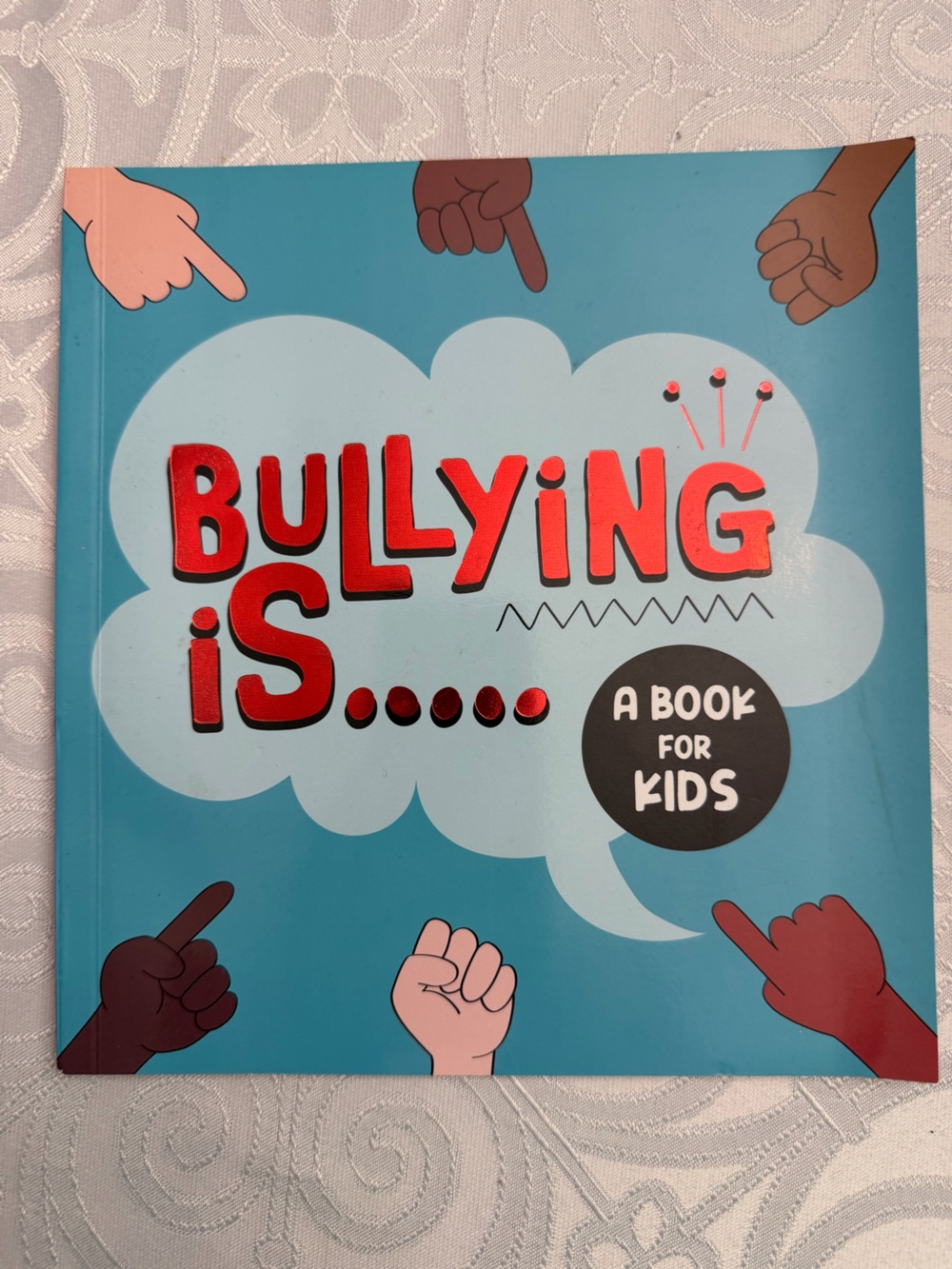 Bullying Is... A Book for Kids – Blue Cover, Red Lettering